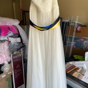 Nice wedding dress only wore for 2 hours has not been altered.